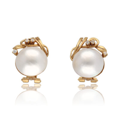 Pendientes "Caratas" oro 1ª ley 18K con perlas cultivadas