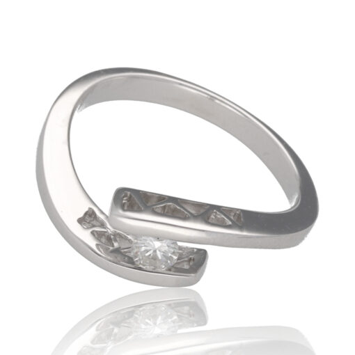 Anillo "Aumia" oro blanco 1ª ley 18K con diamante